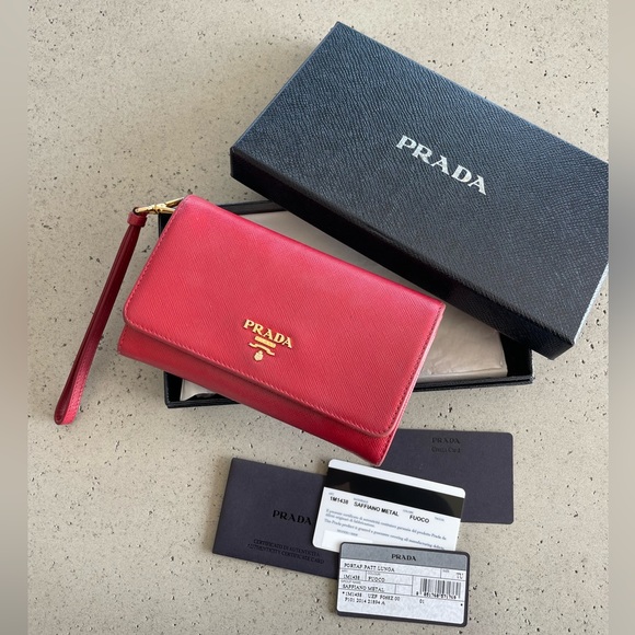 Prada Handbags - PRADA red saffiano wristlet